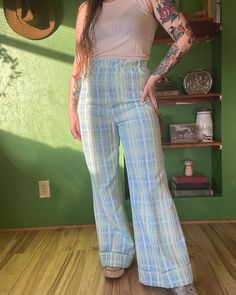 Vintage 70's bell bottoms. No brand or material tag. Care tag reminds me of Graff though. No flaws. Super high waisted.  . Measurements: Waist - 15"  Rise - 14" Hip - 20" Inseam - 27" Retro Flare Bottoms For Summer, Summer Retro Flare Bottoms, Vintage Fitted Bottoms With Elastic Waistband, Summer High Waist Cotton Flares, Summer High-waist Cotton Flares, High Waist Cotton Flares For Summer, Retro Wide Leg Bottoms For Spring, Retro Relaxed Fit Bottoms With Elastic Waistband, Retro Fitted Bottoms With Elastic Waistband