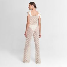 Matching pants are sold separately Ivory crop top Bow details on shoulder straps Embroidery Lace fabric details Sustainable Brand, Matching Pants, Embroidery Lace, Italian Fabric, Fabric Details, Lace Fabric, String Bikinis, Shoulder Straps, Timeless Design