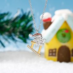 Our Santa Claus necklace is a great way to show your Christmas spirit and even if you don't catch a glimpse of Santa and his reindeer on Christmas eve you'll still have this amazing Christmas necklace to show how thankful you are for all the gifts he brings! Crafted in sterling silver and pave stones, this necklace showcases the Santa Claus  rises from the chimney for a Christmas surprise. Embrace the holiday spirit with this festive necklace and get ready to surprise someone with a fashionable Christmas Anniversary Pendant Necklaces, Holiday Sterling Silver Necklace, Christmas Gift Sterling Silver Necklace, Silver Christmas Holiday Jewelry, Sterling Silver Necklace For Christmas Gift, Silver Jewelry For New Year Holiday, Silver Christmas Pendant Necklace, Silver Holiday Necklaces For Festive Occasion, Silver Holiday Necklace For Festive Occasion