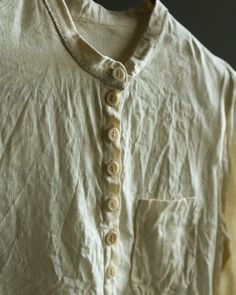 Linen shirt LONDON This shirt is made of 100% natural high-quality lightweight linen, cream color. It's not sheer, but fabric is made of finest linen fibres and some parts of your silhouette can be visible in a bright light. It has a halfway down button closure, tailed hem, band collar, wide cuffs with two buttons on each, small lovely pocket attached with invisible stitch. Cuffs, collar line and pocket are hand stitched with natural linen thread. Buttons are made of palm tree or coconut dependi Neutral Collared Linen Shirt, Flax Linen Collared Shirt, Vintage Collared Linen Shirt, Vintage Linen Shirt With Button Closure, Men’s White Linen Shirt, Mens Linen Outfits, Victorian Shirt, Grandfather Shirts, Collarless Shirt