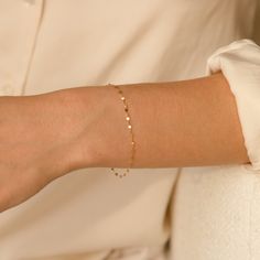 The Twisted Lace Chain Bracelet is an absolute must-have for your wrist. It’s dainty and adds just the right amount of feminine sparkle you have been looking for. If you’re looking for a bracelet you can wear every day - you've found it! It looks amazing on its own and dainty enough to pair with your other favorite bracelets. Crafted of 14k solid gold so you can wear it 24/7 - even to the gym, shower, and to sleep. This bracelet is a sparkly treasure that you'll never want to take off! DETAILS 1 Luxury Gold Bracelet With Single Diamond, Minimalist Style, Bridal Bracelet Gold Danty, Cheap Elegant Chain Bracelet For Wedding, Affordable Rose Gold Dainty Bracelet, Cheap Dainty Bracelets With Delicate Chain, Cheap Minimalist Bracelets With Delicate Chain, Cheap Delicate Chain Bracelet Jewelry, Luxury Dainty Bracelet With Rectangular Links, Cheap Dainty Chain Bracelet