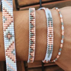 the bracelets are stacked on top of each other