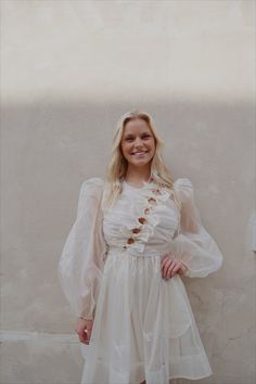 Cutest white + gold dress with bow detailing! Rylie is wearing a small - Zips in the back - Gold + White lines White Gold Dress, Bow Dress, Gold Dress, Dress With Bow, The Back, Romance, White Gold, Gold, How To Wear