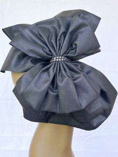 Embrace the essence of glamour with our exquisite 3 layer black bows, beautifully crafted with a 13in x 12in bottom black bow,  10in x 10in middle black bow and a chic 10in x 8in black bow artfully layered on top.  This captivating combination exudes elegance and allure, perfect for making a bold fashion statement.  Secured with a shimmering silver rhinestone closure, the design adds a touch of luxury to the ensemble.  Comfortably nestled on a 13in x 3/4in headband, our exclusive bows are though Elegant Black Fascinator For Party, Elegant Adjustable Ribbon Headband, Satin Bow Headband For Party, Elegant Black Headband Fascinator, Formal Adjustable Headband With Bow, Formal Adjustable Bow Headband, Elegant Bow Headband As Gift, Adjustable Party Fascinator With Satin Bow, Party Fitted Fascinator With Satin Bow