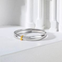 Confidently declare your love for her with this charming wedding band. Buffed to a brilliant luster, this wedding ring symbolizes your vow to honor and cherish her.Weight: 1.64 gWidth: 2.5 mmMaterial: 925 SilverPlating Color: Silver, Yellow Gold White Gold Thick Band Stackable Rings For Wedding, Wedding Stackable Rings In White Gold With Thick Band, Minimalist Promise Band, White Gold Jewelry With Thick Band For Promise, Dainty Stackable Wedding Rings With Thick Band, Wedding Stackable Rings With Thick Band, Gold Sterling Silver Couple Rings For Wedding, Elegant Thick Band Couple Rings For Gift, Dainty White Gold Bands For Formal Occasions