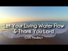 the words let your living water flow and thank you lord in front of an ocean