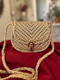 A very stylish bag with its useful and unusual form. You can use it day or night. The bag is croched of polyester macrame yarn and plastic canvas base * Strap: 120 cm , 47 in * 19x15x4,5 cm - 7,5x6x1,7 in * Metal  closure Beige Straw Shoulder Bag For Gift, Beige Straw Shoulder Bag Gift, Beige Crossbody Straw Bag As Gift, Handheld Woven Crochet Bag As Gift, Handheld Crochet Woven Bag Gift, Natural Straw Crossbody Bag As Gift, Natural Color Crossbody Straw Bag As Gift, Beige Crochet Bags As Gift, Beige Crochet Bag For Gift