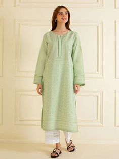 vibrant and fashionable embroidered lawn shirt with pant perfect for adding a touch of elegance and style to your wardrobe. Made from high-quality lawn fabric, this shirt offers comfort and breathability, making it an ideal choice. Length : 45" Pants Fabric : Lawn Pista Green Straight Kurta For Spring, Eid Pista Green Kurta With Floral Embroidery, Pista Green Cotton Salwar Kameez With Floral Embroidery, Spring Designer Traditional Wear In Pista Green, Spring Pista Green Traditional Wear With Chikankari Embroidery, Green Traditional Wear With Floral Embroidery In Mulmul, Pista Green Churidar With Chikankari Embroidery For Spring, Spring Pista Green Churidar With Chikankari Embroidery, Green Mulmul Traditional Wear For Spring