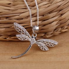 This is solid 925 sterling silver dragonfly pendant with cubic zirconia micro setting . Rhodium plated for long lasting shine. 925 stamped Approx. measures:         Total length: 28mm         Without bail: 20mm          Width: 32mm   Available on it's own or with various length (16-30 Inch ) 1mm curb chain, please choose from the drop down menu at the top of the page. Presented in gift box. Thank you for looking! Elegant Silver Dragonfly Jewelry, Elegant Sterling Silver Dragonfly Jewelry, Elegant Sterling Silver Dragonfly Necklace, Dragonfly Jewelry, Dragonfly Necklace, Dragonfly Pendant, Vintage Style Jewellery, Copper Necklace, Curb Chain