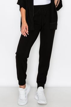 Made for active or relaxed days, these high rise relaxed joggers are the newest style added to our loungewear collection. Featuring a high-rise elasticized waistband with a drawstring detail, two pockets on each hip and cuffed hems, you’re going to love these full length loungewear joggers . High rise elasticized waistband Drawstring feature Two pockets on each hip Ultra-soft knit fabric with stretch 62% Polyester, 33% Rayon, 5% Spandex Imported Model StatsHEIGHT: 5'5" BUST: 32WAIST: 25.5HIPS: 3 Solid Color Drawstring Sweatpants For Loungewear, Comfortable Loungewear Activewear With Drawstring, Relaxed Fit Drawstring Bottoms For Loungewear, Comfortable Drawstring Joggers For Lounging, Solid Color Drawstring Sweatpants For Lounging, Athleisure Loungewear Bottoms With Drawstring, Comfortable Activewear With Drawstring, Relaxed Fit Drawstring Sweatpants For Lounging, Athleisure Bottoms With Drawstring For Loungewear