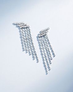 Suzanne Kalan Classic Diamond Angel Drop Earrings in 18k white gold Silver Baguette Cut Diamond Earrings For Formal Occasions, Elegant White Gold Diamond Earrings With Baguette Diamonds, Luxury Baguette Cut Diamond Earrings For Formal Occasions, Elegant Baguette Diamond Earrings For Anniversary, Luxury Formal Baguette Cut Diamond Earrings, Luxury Platinum Dangle Diamond Earrings, Luxury Diamond Earrings With Baguette Cut, Silver Baguette Cut Diamond Earrings, Luxury Platinum Baguette Cut Earrings