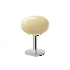 a white light sitting on top of a metal stand