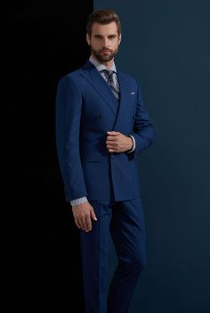 This blue suit for men or women is an amazing addition to any new suit wardrobe and a great enhancement to established suit wardrobes. With the neutral and bold blue color, you will not only be seen as a leader, but you will be able to partner this suit with multiple color options for any season and any situation. This is a piece that everyone should have in their collection. Like this look, but want to make some changes? Chat with a stylist or book an appointment. FREE SHIPPING ON ORDERS OVER $ Blue Single-breasted Tuxedo For Workwear, Blue Single Breasted Tuxedo In Suiting Fabric, Blue Single-breasted Tuxedo In Suiting Fabric, Tailored Blue Suiting Fabric Outerwear, Tailored Blue Outerwear In Suiting Fabric, Blue Double Breasted Tuxedo Suit For Work, Blue Tuxedo Blazer For Semi-formal Occasions, Blue Tuxedo Style Blazer In Suiting Fabric, Blue Tuxedo Blazer In Suiting Fabric