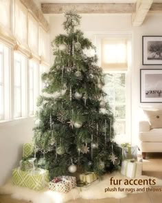 a decorated christmas tree in a living room