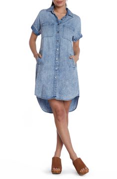 This lightweight denim shirtdress is designed in a classic straight silhouette with short sleeves and a rounded high-low hem. Front button closure Spread collar Short sleeves Chest patch pockets; side-seam pockets 50% cotton, 50% lyocell Machine wash, tumble dry Imported Summer Button-up Chambray Shirt Dress, Denim Blue Chambray Short Sleeve Dress, Chambray Short Sleeve Dress With Pockets, Short Sleeve Chambray Dresses With Pockets, Relaxed Fit Short Sleeve Denim Dress, Relaxed Fit Short Sleeve Denim Dress For Day Out, Relaxed Fit Denim Dress With Pockets, Relaxed Fit Denim Dress With Short Sleeves, Trendy Short Sleeve Shirt Dress For Day Out