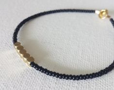 Black bracelet,seed bead bracelet,friendship bracelet,minimalist bracelet,beaded bracelet,ankle bracelet, anklet, nuggets, delicate bracelet Minimalist Gold Beaded Bracelets, Minimalist Bracelets With Spacer Beads, Minimalist Friendship Bracelets With Gold Beads, Minimalist Gold Beaded Friendship Bracelets, Minimalist Friendship Bracelet With Gold Beads, Minimalist Gold Beaded Friendship Bracelet, Simple Gold Bracelet With Small Beads, Simple Gold Beaded Bracelet, Wonder Woman Bracelet