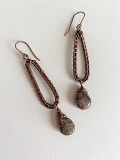 Artisan Dangle Teardrop Earrings With Ear Wire, Artisan Teardrop Dangle Earrings With Ear Wire, Copper Dangle Teardrop Earrings, Wire Wrapped Copper Teardrop Dangle Earrings, Teardrop Wire Wrapped Wrap Earrings In Metal, Teardrop Wrap Earrings As Gift, Teardrop Wrap Earrings For Gift, Copper Wire Teardrop Earrings, Nickel-free Copper Wire Teardrop Earrings