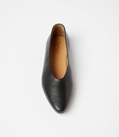 Slip into comfort and style with these versatile black leather ballet flats! Featuring a pointed toe design, these flats are perfect for any occasion. Dress them up or down, these flats are sure to be a staple in your wardrobe. True to size Material: Leather Heel height: 0.25" Imported Seychelles Wipe with soft cloth | Karen Kane Pointed Toe Ballet Flats in Black, Size 9.5, Plain Slip-on Low Heel Ballet Flats For Work, Pointed Toe Ballet Flats For Everyday, Workwear Ballet Flats With Medium Width Slip-on, Workwear Ballet Flats With Medium Width And Slip-on Shape, Workwear Ballet Flats With Medium Width And Slip-on Design, Everyday Pointed Toe Ballet Flats Medium Width, Medium Width Slip-on Ballet Flats For Office, Spring Business Slip-on Ballet Flats, Fall Workwear Ballet Flats With Rubber Sole