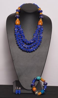 ALL SALES ARE FINAL This gorgeous  bead statement necklace adds a bold pop to any outfit!  Handmade item ALL SALES ARE FINAL Blue Jewelry With Wooden Beads, Multicolor Wooden Beaded Necklaces For Party, Multicolor Wooden Beads Necklace For Party, African Jewelry Necklaces, African Beaded Jewelry, Clothes Videos, Dainty Fine Jewelry, Turquoise Ring Engagement, Pebble Jewelry