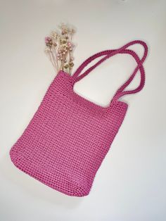 Here's something that is sure to get your attention! Our gorgeous pink shopper bag made on crochet is the perfect addition to your closet. It was handmade and is very practical. It will hold everything you need during the day. Its dimensions are 24 cm wide, 28 cm high, and the handle is 23 cm long. This beautiful handbag adds charm to any styling, and is perfect for any occasion. Don't delay and add it to your collection today! Crochet Cross Body Bag, Everyday Shoulder Bag, Crochet Cross, Beautiful Handbags, Handmade Bag, Bag Crochet, Bag Handmade, Shopper Bag, Cross Body Bag