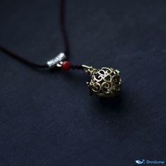 OrcaJump - Exquisite Filigree Sachet Locket Necklace - A Sophisticated Piece of Jewelry Elegant Brass Necklaces With Decorative Details, Elegant Decorative Brass Necklaces, Vintage Brass Necklaces For Meditation, Adjustable Metal Filigree Necklace, Adjustable Filigree Pendant Necklace, Adjustable Pendant Necklace With Filigree Details, Antique Gold Spiritual Necklace, Antique Gold Round Spiritual Necklace, Adjustable Filigree Necklace For Gift