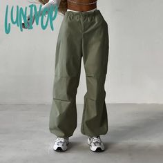 45279908266235|45279908299003|45279908331771 Y2k Style High Waist Green Bottoms, Y2k Style Baggy Parachute Pants For Summer, Y2k Style Bottoms For Spring, Green Baggy Y2k Cargo Pants, High Waist Green Cargo Pants Y2k Style, Y2k Green Cargo Pants For Streetwear, Y2k Style Green Cargo Pants For Streetwear, Green Y2k Cargo Pants For Streetwear, Green Y2k Style Baggy Cargo Pants