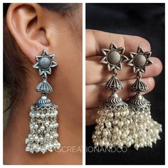 Add charm and charisma to your beautiful personality with these exquisitely designed and handcrafted high quality suryankanti earrings lined with fine lustrous pearls.Pair them up with any formal or semi formal attire and gather compliments wherever you go. Suitable for both casual and dressy occasions.Colour: Antique Length 2.8 inches Each earring weighs 12 gms (lightweight)*****************************************Note: All in stock items will be shipped from New Delhi, India within 2-3 busines Elegant Silver Jhumkas For Festival, Handmade Elegant Earrings For Navratri, Elegant Handmade Earrings For Navratri, Traditional Pearl Drop Earrings In Sterling Silver, Traditional Metal Earrings With Pearl Drop, Elegant Heavy Jhumkas For Festival, Bohemian Silver Bridal Earrings With Latkans, Bohemian Bridal Earrings With Latkans In Silver, Bohemian Bridal Silver Earrings With Latkans