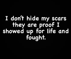 a black and white photo with the words i don't hide my scars they are proof