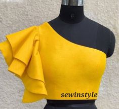 1. Fabric - Silk. 2. One shoulder blouse. 3. Bell sleeves blouse. 4. Customize in any color and size. One Shoulder Blouse Pattern, One Shoulder Blouse Designs, Bell Sleeves Blouse Indian, Bell Sleeve Blouse Design, Bell Sleeves Blouse, Blouse Bell Sleeves, Smart Outfits, Blouse Tops Designs, Blouse Indian