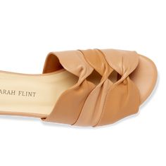 Arabesque Slide – Sarah Flint Chic Leather Mules For Vacation, Chic Brown Leather Slides, Elegant Brown Flat Slides, Chic Brown Slides With Leather Footbed, Brown Leather-lined Slides For Spring, Spring Leather-lined Slip-on Slides, Chic Leather-lined Slides For Spring, Summer Slip-on Mules With Leather Lining, Leather Slide Mules For Vacation