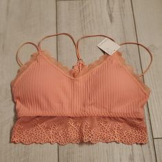 Coral Colored M/L Bralette Spring Camisole Bra With Delicate Straps, Spring Cami Bra With Delicate Straps, Seamless Lace Bra For Spring, Spring Camisole Bra With Delicate Lace, Spring Lace Cami Bra, Spring Cami Bra With Lace Trim, Spring Underwire Tops With Straps, Cami Bra For Loungewear, Spring Lace Bra With Delicate Straps