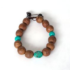 Gift a symbol of deep spiritual connection this Valentine's Day with our handmade Nepali Bodhi beads bracelet. Each bead, introduced and blessed by His Holiness the Dalai Lama, encapsulates the essence of love and mindfulness to help you feel peaceful and connect with your inner self. Our adjustable bracelet, crafted in the heart of the Himalayas, features authentic grey Bodhi beads from Nepal. Revered in Hinduism and Buddhism for their spiritual significance, these beads have been introduced to Spiritual Wooden Beaded Healing Bracelets, Handmade Brown Beaded Bracelets For Ceremonial Use, Handmade Brown Beaded Bracelets For Rituals, Spiritual Brown Beaded Bracelets For Rituals, Spiritual Brown Rosary Bracelet For Meditation, Adjustable Turquoise Beaded Bracelets In Holistic Style, Meditation Rosary Bracelet With Wooden Beads, Spiritual Handmade Wristband For Festivals, Handmade Spiritual Wristband For Festivals