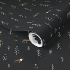 a black wallpaper with deer and trees on it