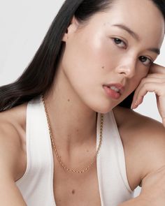 Adorn yourself with the textured and versatile Judie Necklace. Designed with a 20" long oval rice bead chain, this piece is perfect for subtle layering. Layer it for maximum impact with the Jalia Pendant. Details: Dimensions: 2.8mm thick chain, 18" inches long with extension of 2" 14k gold over brass Nickel free Jewelry Care Avoid perfumes, salt water, sanitizers and excessive exposure to water Take jewelry off before bed and swimming. Store in soft duster pouch Use Sophie Blake Jewelry Polishin Everyday Delicate Oval Chain Jewelry, Oval Link Cable Chain Necklace For Layering, Delicate Rolo Chain Necklace For Everyday, Delicate Everyday Oval Link Necklace, Classic Oval Link Necklace For Everyday, Everyday Toggle Link Necklace, Dainty Oval Necklace For Everyday Wear, Everyday Oval Jewelry With Cable Chain, Minimalist Figaro Chain Necklaces With Oval Link