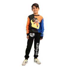 Gear up your young Saiyan with this officially licensed Dragon Ball Z youth 2-piece set. The pullover sweatshirt features a striking graphic of Goku, while the joggers showcase the title logo and add an authentic touch to the ensemble. Crafted with high-quality cotton and polyester materials, this 2-piece set ensures both comfort and durability, making it perfect for young fans to wear during their adventures and training sessions. Whether they're channeling their inner Super Saiyan or just hang Dragon Ball Z Goku, Dragon Ball Goku, Super Saiyan, Fleece Joggers, Jogger Set, Pants Outfit, Dragon Ball Z, Pullover Sweatshirt, Dragon Ball