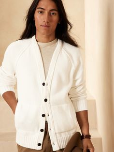 Crafted from organic cotton with a softly structured ribbed knit, this traditional style features a button front and pockets- little details that will have you longing for cabin escapes and brisk mornings.  OVERSIZED FIT: Relaxed, boxy fit with a dro Everyday Ribbed Outerwear With Relaxed Fit, Relaxed Fit Button-up Sweater With Pockets, Classic Everyday Ribbed Outerwear, Cozy Everyday Cardigan With Pockets, Classic Relaxed Fit Sweater With Pockets, Everyday Cotton Button Cardigan, Cotton Cardigan With Buttons For Everyday, Everyday Cotton Cardigan With Buttons, Casual Ribbed Cardigan With Relaxed Fit