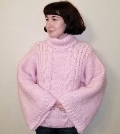 Pink Knit Sweater Chunky Knit Sweater Turtleneck Knit Sweater Oversized Knit Sweater Cable Knit Sweater Cozy Sweater Wool Sweater Our products are created according to customer's exact sizes. Every clothing is knitted with love.  With personalization you can tell us your exact sizes. Handmade Materials: Acrylic 30 degree Wash/ Hand Wash See more hand knitted products of our shop https://www.etsy.com/shop/TINAFASHIONSHOP Pink Chunky Sweater, Oversized Cable Knit Poncho, Cozy Long Sleeve Cable Knit Poncho, Cold Weather Knitted Acrylic Sweater, Cozy Pink Knitted Cropped Sweater, Pink Cable Knit Acrylic Sweater, Pink Chunky Knit Acrylic Sweater, One Size Chunky Knit Acrylic Sweater, Oversized Cozy Acrylic Cropped Sweater