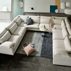 a living room with a large sectional couch