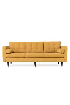 A handsome sofa with all the trapping of Mid-century style in one chic package, plus dapper bolster pillows. With chic bolsters and custom fabric or leather options, the Braxon sofa is as comfortable as it is stylish. 90"w x 36"d x 35"h 1970 Living Room, Joybird Couch, Library Makeover, Fireplace Vintage, Big Fireplace, Living Room Library, Couch With Ottoman, 1920s House, Mexico House