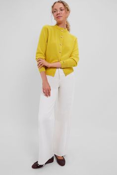 The Marigold Quinn Cashmere Cardigan will bring brightness to any day! With a front button placket and ultra-soft construction, this silhouette is relaxed while still having a flattering, tailored fit. Pair unbuttoned with a tank and denim or with a floral maxi skirt and ballet flats for a pop of yellow! Crewneck Long sleeves with ribbed cuffs Front button placket Gold buttons Ribbed hem Relaxed fit Material: 100% Cashmere Care: Dry clean only Cashmere Workwear Cardigan With Button Closure, Formal Single-breasted Button-up Cardigan, Classic Solid Single Breasted Cardigan, Formal Cashmere Cardigan With Button Closure, Classic Single Breasted Solid Cardigan, Solid Color Sweater With Button Closure For Work, Elegant Solid Color Button-up Sweater, Elegant Button-up Sweater, Formal Button-up Sweater With Button Closure