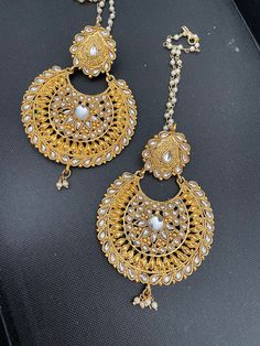 Gold plated round lightweight Chandbalis with Kundan. The oversized round earrings are a show stopper. Comes with pearls saharas attached. Easy push back closure. A perfect match to any desi outfit. Chandbalis Earrings, Bridal Necklace Set, Beautiful Inside And Out, Red Stone, Bridal Necklace, Round Earrings, White Ring, Matching Earrings, Perfect Match