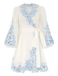 The Golden Embroidered Mini Dress in Ivory/Blue from our Summer Swim 2024 Collection. A linen embroidered mini dress featuring a wrap around waist belt, a deep V-neckline and blouson sleeves. Designer Resort Wear, Resort Wear Dresses, F1 Wag, Embroidered Mini Dress, One Piece Clothing, Resort Dresses, Linen Mini Dress, Summer Swim, Dr Closet