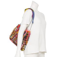 You'll love the colorful style of this AmeriLeather Papillon leather shoulder bag. You'll love the colorful style of this AmeriLeather Papillon leather shoulder bag. DETAILS 14.5"L x 11.25"H x 6.25"W Handle: 12'' drop Magnetic snap closure Silver-tone hardware Interior: 1 zip pocket, 2 slip pockets Water repellentCONSTRUCTION & CARE Exterior: leather Lining: polyester Wipe clean Imported Size: One Size. Color: Multicolor. Gender: female. Age Group: adult. Material: Cotton. Trendy Multicolor Hobo Bag Tote, Trendy Multicolor Hobo Tote Bag, Multicolor Satchel Hobo Bag For Shopping, Multicolor Canvas Shoulder Bag For Shopping, Multicolor Leather Rectangular Hobo Bag, Multicolor Leather Bucket Shoulder Bag, Multicolor Leather Tote Shoulder Bag, Multicolor Satchel Shoulder Bag With Adjustable Strap, Multicolor Leather Shoulder Bag For Daily Use