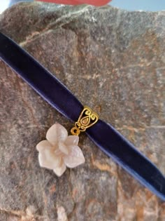 Blue velvet ribbon choker with pearl orchid . Size of orchid 15-18 mm width Gold plated or silver plated findings , depends on pics you see ( bail, clasps,lobster clasp, extended chain). If you want to change color for the clasps please leave the note by checkout. Length of choker is adjustable.+5 cm Regency Jewelry, Blue Velvet Ribbon, Necklace With Pearl, Ribbon Choker, Accessories Blue, Navy Blue Velvet, Choker Chain, Ribbon Necklace, Funky Jewelry