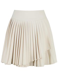 This is HYBERNAT’s unique pleated mini skirt features a layered style that adds a touch of uniqueness to your look. The pleats create a different look, and the dense stitching along the lines adds detail to the design.- Perfect for daily wear- Can be paired with various tops to create different looks- Its unique design makes it easy to match with any outfit, adding a stylish touch Spring Asymmetrical Skirt With Accordion Pleats, Elegant Pleated Tiered Skort, Elegant Tiered Pleated Skort, Pleated Asymmetrical Fitted Mini Skirt, Fitted Pleated Asymmetrical Mini Skirt, Fitted Asymmetrical Pleated Mini Skirt, Chic Skirted Skort With Pleated Hem, Chic Pleated Hem Tiered Mini Skirt, Spring Asymmetrical Pleated Skirt With Accordion Pleats