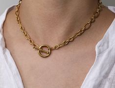 Who doesn’t love versatile? Wear this piece with the clasp in the front or back depending on your style! This stylish necklace is perfect for a simple look to wear alone or stacked with a few of our other HOJM necklaces. The quality and simplicity of it make for a necklace you never want to take off. Material: Gold Plated over Stainless Steel Base. Tarnish Free and Water Resistant Length: 16inch Allergies: Hypoallergenic Chic Everyday Toggle Link Necklace, Chic Everyday Link Toggle Necklace, Minimalist Adjustable Chain Necklace With Lobster Clasp, Trendy Everyday Toggle Necklace With Adjustable Chain, Trendy Link Toggle Necklace For Everyday, Everyday Toggle Link Necklace, Everyday Link Toggle Necklace, Chic Toggle Necklace With Paperclip Chain For Everyday, Chic Everyday Toggle Necklace With Paperclip Chain