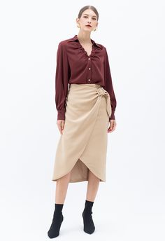 Put an elegant look by wearing this unique collection from Chicwish. Featuring asymmetric hemline and flap design and made to accentuate your body type, this skirt will surely give you that extra oomph and make you stand out wherever you go wearing this.    - High waist  - Flap front with O-ring at waist  - Asymmetric hem  - Concealed back zip closure  - Lined  - 100% Polyester  - Hand wash cold            Size  Length  Waist  Hip      XS  cm  60-78  66  90      inch  23.5-30.5  26  35.5      S  cm  61-79  70  94      inch  24-31  27.5  37      M  cm  62-80  74  98      inch  24.5-31.5  29  38.5            * Our model is 176 cm/5'9" tall and wearing size XS Elegant Fitted Asymmetrical Skirt, Elegant Formal Skirt With Asymmetrical Hem, Elegant Draped Skirt With Asymmetrical Hem, Chic Asymmetrical Draped Skirt, Elegant Bottoms With Asymmetrical Hem For Formal Events, Elegant Formal Bottoms With Asymmetrical Hem, Elegant Bottoms With Asymmetrical Hem, Formal Lined Skirt With Asymmetrical Hem, Elegant Fitted Bottoms With Asymmetrical Hem