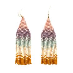 A lovely fade of blending colors of beads make these handmade earrings an easy compliment to every day wear. Glass beads design is secured with a gold plated brass ear wires. 4 inch height x 1 wide Ombre Beaded Fringe Earrings are handmade in a fair trade workshop in Guatemala. Bugle Bead Earrings, Ombre Fringe Earrings, Midnight Plum, Blending Colors, Fringe Earring, Honey Dew, Beads Design, Beaded Fringe Earrings, Bugle Beads