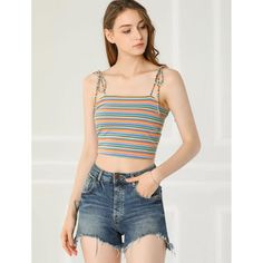 This feminine beach cropped top is styled with charming multicolor stripes and tie shoulder straps. A stretchy slim top that also makes a cute underlayer for streetwear boasts a riveting rainbow of stripes. A chic fashion and now an essential for today, this cami top is made from a soft, stretchy knit jersey with spaghetti straps for a comfortable fit. Casual Summer Tank Top With Straps, Casual Sleeveless Striped Crop Top, Casual Striped Sleeveless Crop Top, Trendy Striped Tank Top For Spring, Striped Cotton Spaghetti Strap Tank Top, Adjustable Straps Crop Top For Beach Season, Sleeveless Crop Top With Knotted Straps For Beach, Casual Beach Tank Top With Tie Straps, Casual Beach Camisole With Knotted Straps