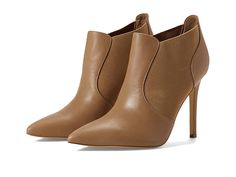 Nine West Kaia - Women's Shoes : Nude : Step up your style and confidence by wearing the cool and casual Nine West Kaia boots. Leather and textile upper, lining, and insole. Slip-on style with elasticized side panels. Stilettoe heel. Ankle-length boots. Pointed toe silhouette. Synthetic outsole. Imported. Measurements: Heel Height: 4 in Weight: 9.5 oz Shaft: 5 in Product measurements were taken using size 8.5, width M. Please note that measurements may vary by size. Weight of footwear is based o Chic Fitted Chelsea Boots For Fall, Fall High-top Heeled Boots For Workwear, High-top Heeled Boots For Work In Fall, Chic Fitted Ankle-high Chelsea Boots, Fitted Chelsea Boots With Almond Toe For Fall, Chic Fitted Chelsea Boots For Work, Chic Ankle-high Boots With Rubber Heel Cap, Fitted Pointed Toe Chelsea Boots For Spring, Chic Heeled Boots With Rubber Heel Cap For Fall